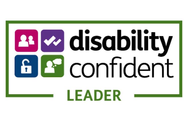 badge with people, checkmark, lock and conversation icons with text "disability confident leader"