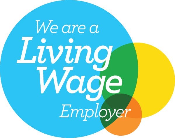 badge stating "We are a Living Wage Employer"