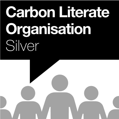 icons of people standing with text above saying" Carbon Literate Organisation. Silver"