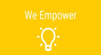 image with yellow background with light bulb icon and the text " We Empower"